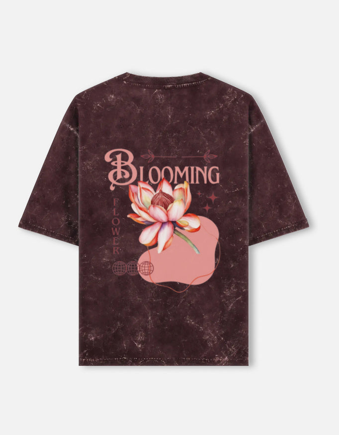 Back view of LYVIT ORIGINALS acid washed oversized T-shirt with a relaxed fit and faded, vintage-inspired design.