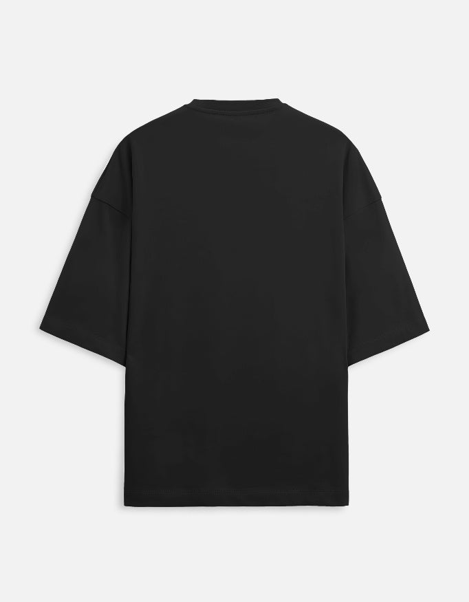 Back view of unisex oversized terry cotton tee by LYVIT ORIGINALS, showcasing relaxed fit and soft fabric in natural lighting.