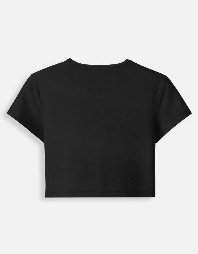 Back view of a LYVIT ORIGINALS baby tee in soft fabric, showcasing the simple design and comfortable fit.