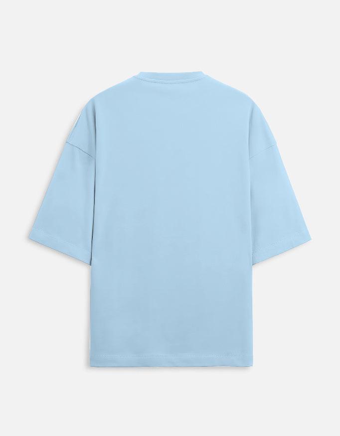 Back view of LYVIT Originals unisex oversized terry tee, showcasing its relaxed fit and soft fabric in natural lighting.
