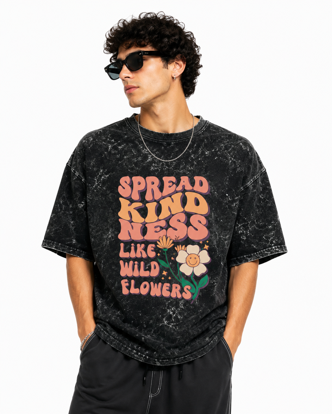 Unisex acid washed oversized T-shirt by LYVIT ORIGINALS, showing a relaxed fit with a faded, vintage style fabric.