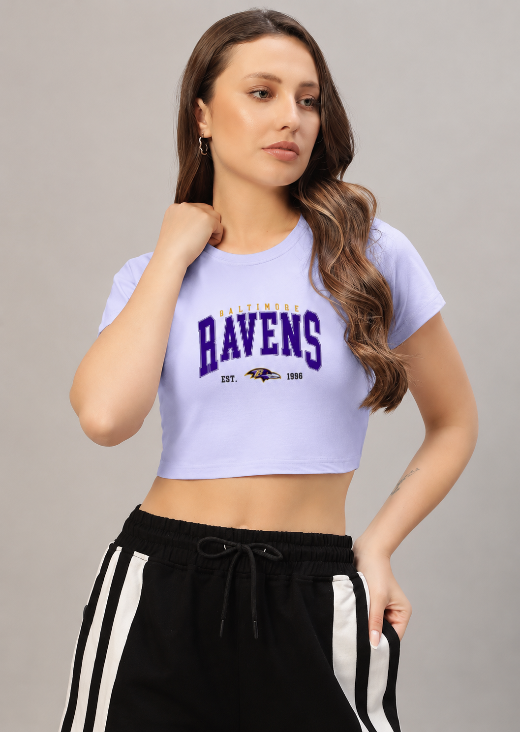 Black LYVIT ORIGINALS crop top with short sleeves and a fitted design, shown on a plain white background.