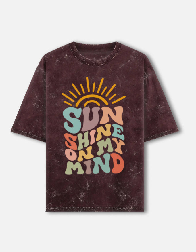 Front view of LYVIT ORIGINALS unisex acid washed oversized T-shirt showcasing its relaxed fit and vintage style.