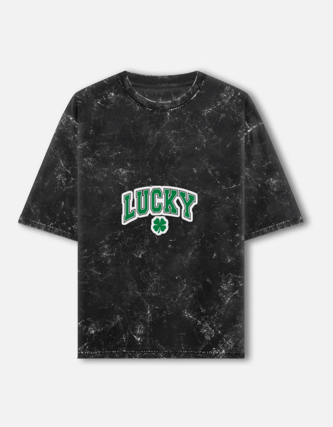 Unisex acid washed oversized tee by LYVIT ORIGINALS displayed from the front view, showcasing its casual, relaxed fit and distressed fabric.