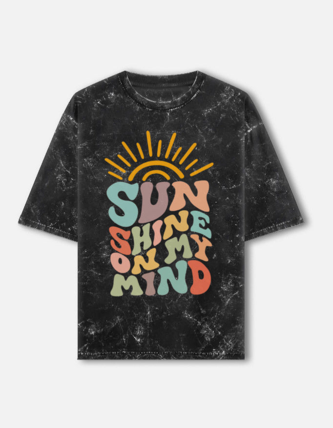 Unisex acid washed oversized LYVIT ORIGINALS tee showing front view with a relaxed fit and faded distressed design.