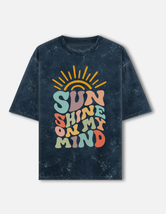 Unisex acid washed oversized T-shirt by LYVIT ORIGINALS, front view showing distressed, vintage-inspired fabric and relaxed fit.