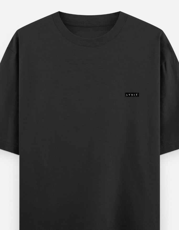 Unisex oversized classic T-shirt by LYVIT ORIGINALS with a left chest pocket, displayed on a plain background.
