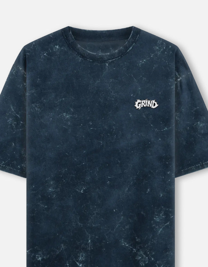 Acid washed oversized LYVIT ORIGINALS T-shirt with a left chest pocket, casual streetwear style, shown from the front.