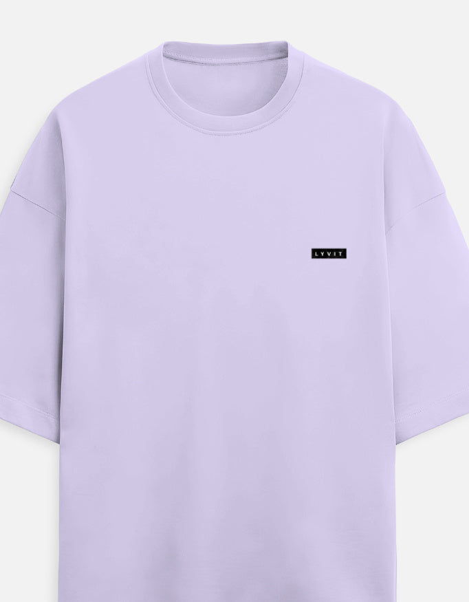 Unisex Terry Oversized Tee by LYVIT ORIGINALS featuring a left chest pocket and relaxed fit in soft terry fabric.
