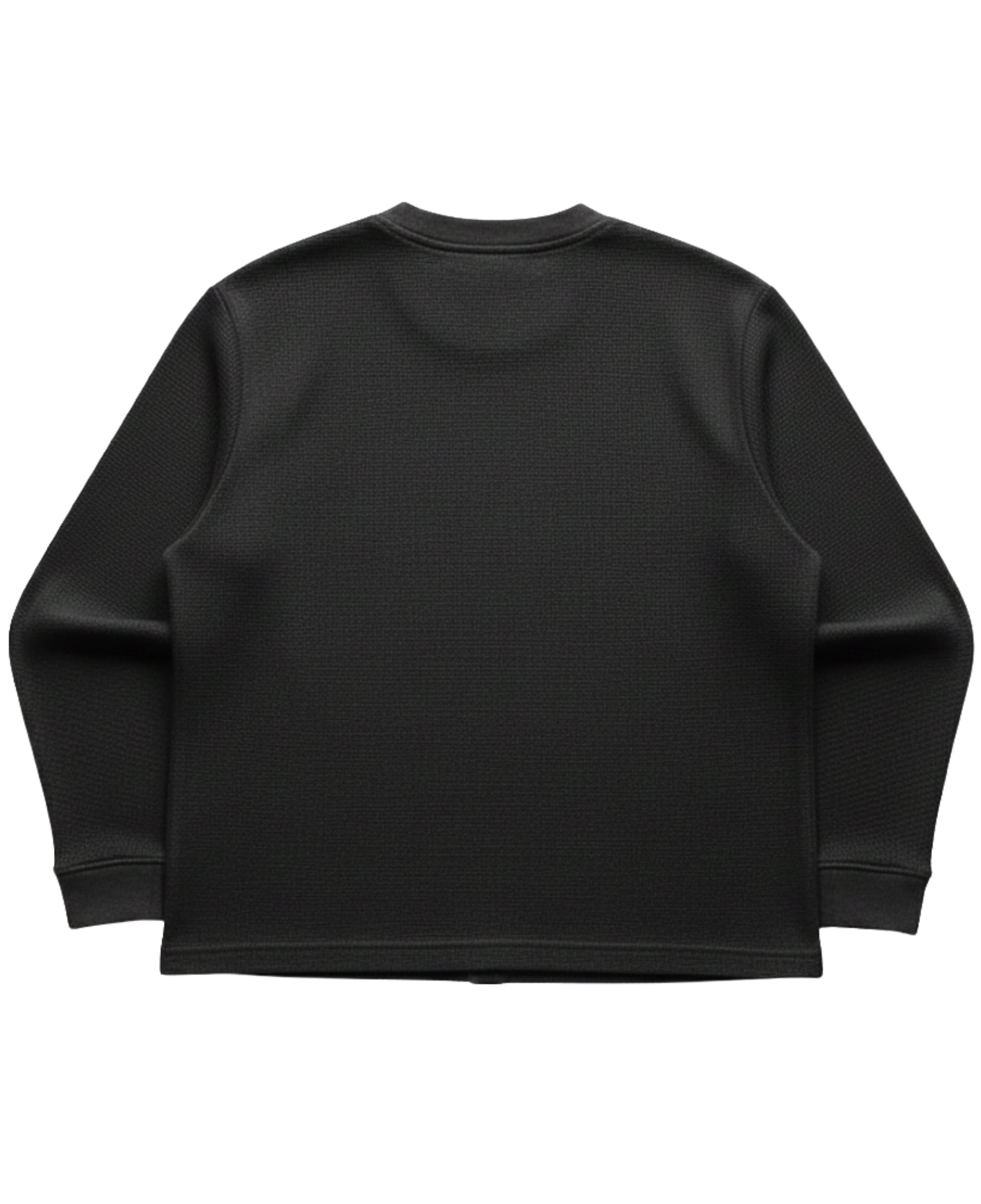 Back view of LYVIT ORIGINALS waffle knit oversized full sleeve sweater, showcasing its relaxed fit and cozy fabric.